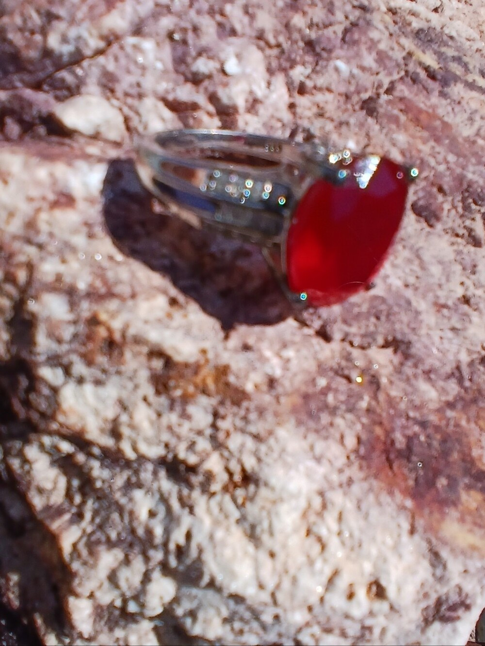 Garnet Stone Set In Silver Band